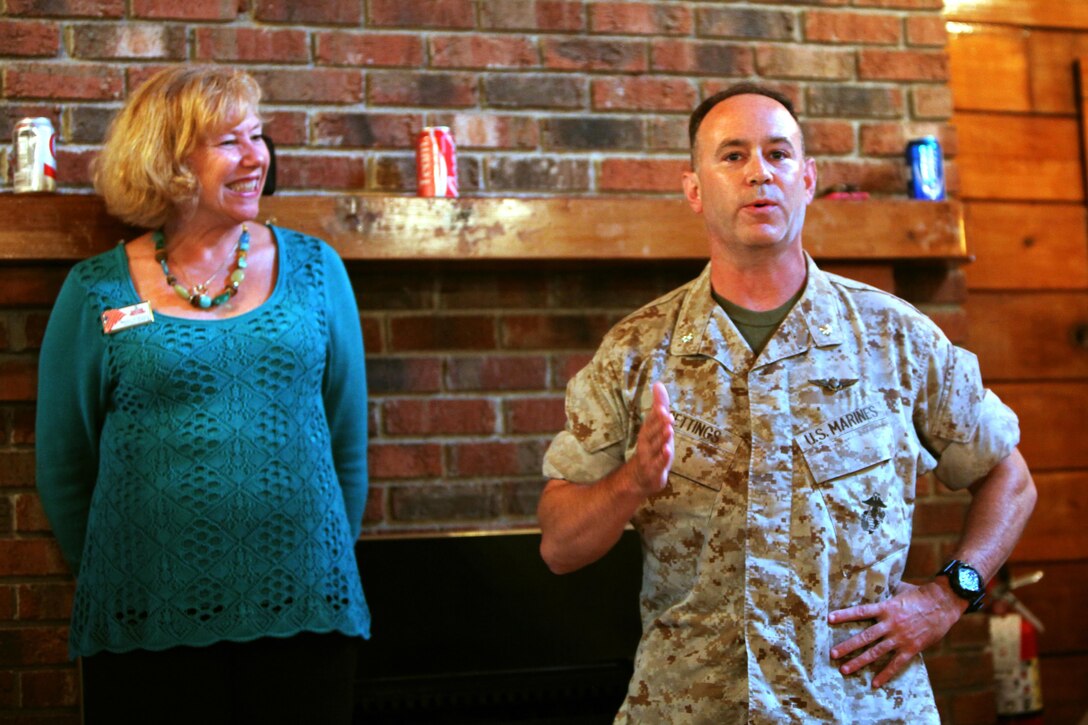 Lt. Col. Jeremy L. Gettings expresses his gratitude to the community and Marines with Headquarters and Headquarters Squadron and Marine Transportation Squadron 1 for the hard work and service they provided at a bi-annual Pig Picking at Marine Corps Air Station Cherry Point, N.C., Sept. 22, 2015. The event was sponsored by the Havelock Military Affairs Committee. Gettings is the commanding officer of H&HS. (U.S. Marine Corps photo by Pfc. Nicholas P. Baird/ Released)