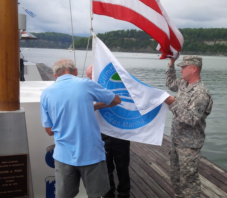 NASHVILLE, TENN., (Sept. 14, 2015) – With the sound of marine boat motors in the background, the U.S. Army Corps of Engineers, Nashville District presented a ‘Clean Marina’ certification flag to a Lake Cumberland marina during a brief ceremony Sept. 10, 2015.   
Conley Bottom Resort in Monticello, Ky., became the first marina on Lake Cumberland to earn the distinguished certification. 

