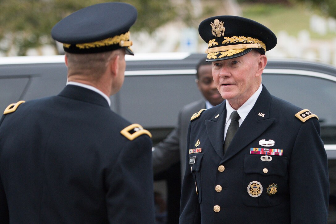 Army Gen. Martin E. Dempsey, chairman of the Joint Chiefs of Staff, arrives to place a wreath at the Tomb of the Unknown Soldier at Arlington National Cemetery in Arlington, Va., Sept. 25, 2015. Dempsey laid the wreath to honor unknown service members as he prepared to retire after 41 years of service. Maj. Gen. Bradley A. Becker, commanding general of the Military District of Washington, hosted the ceremony.