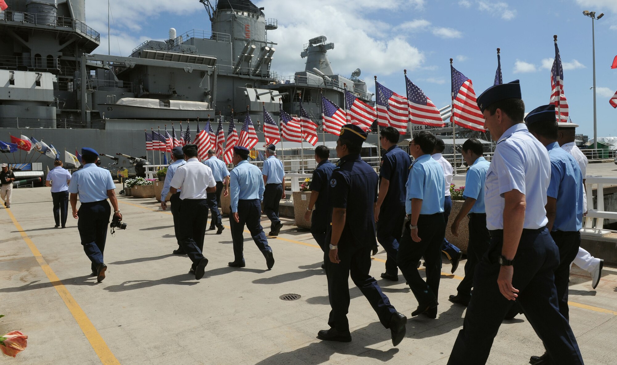 Pacific Rim Airpower Symposium attendees enter the USS Battleship Missouri Memorial during a tour of Pearl Harbor historic sites Sept. 22, 2015, in Honolulu, Hawaii. Senior officer and enlisted airmen from nations throughout the Indo-Asia-Pacific region attended the symposium to discuss ways to improve cooperation, leadership and coordination efforts. (U.S. Air Force photo by Staff Sgt. Alexander Martinez/Released)