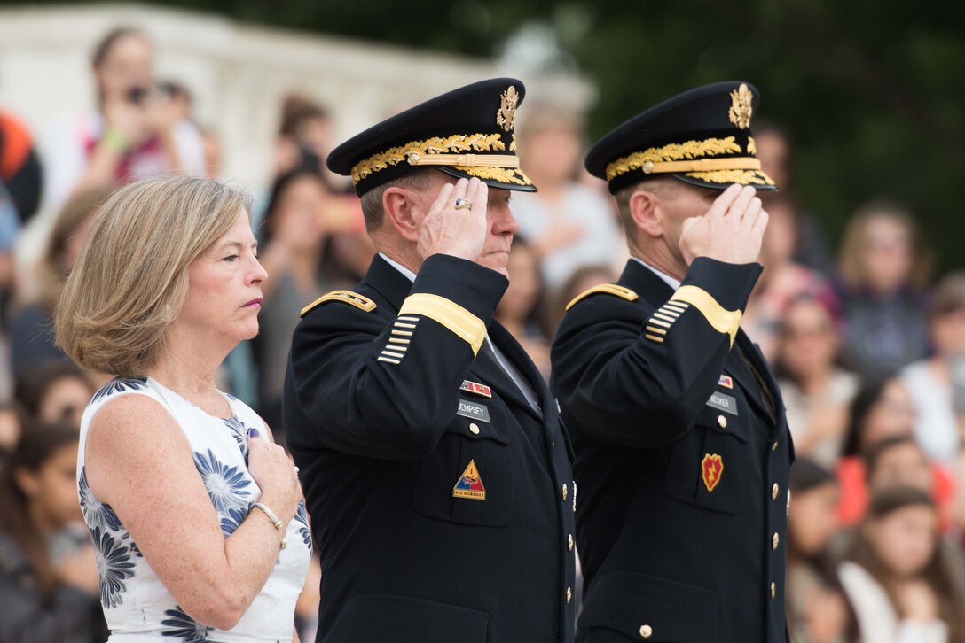 Army Gen. Martin E. Dempsey, chairman of the Joint Chiefs of Staff, and his wife, Deanie, render honors while participating in a wreath-laying ceremony at the Tomb of the Unknown Soldier at Arlington National Cemetery in Arlington, Va., Sept. 25, 2015. U.S. Army photo by Spc. Cody W. Torkelson