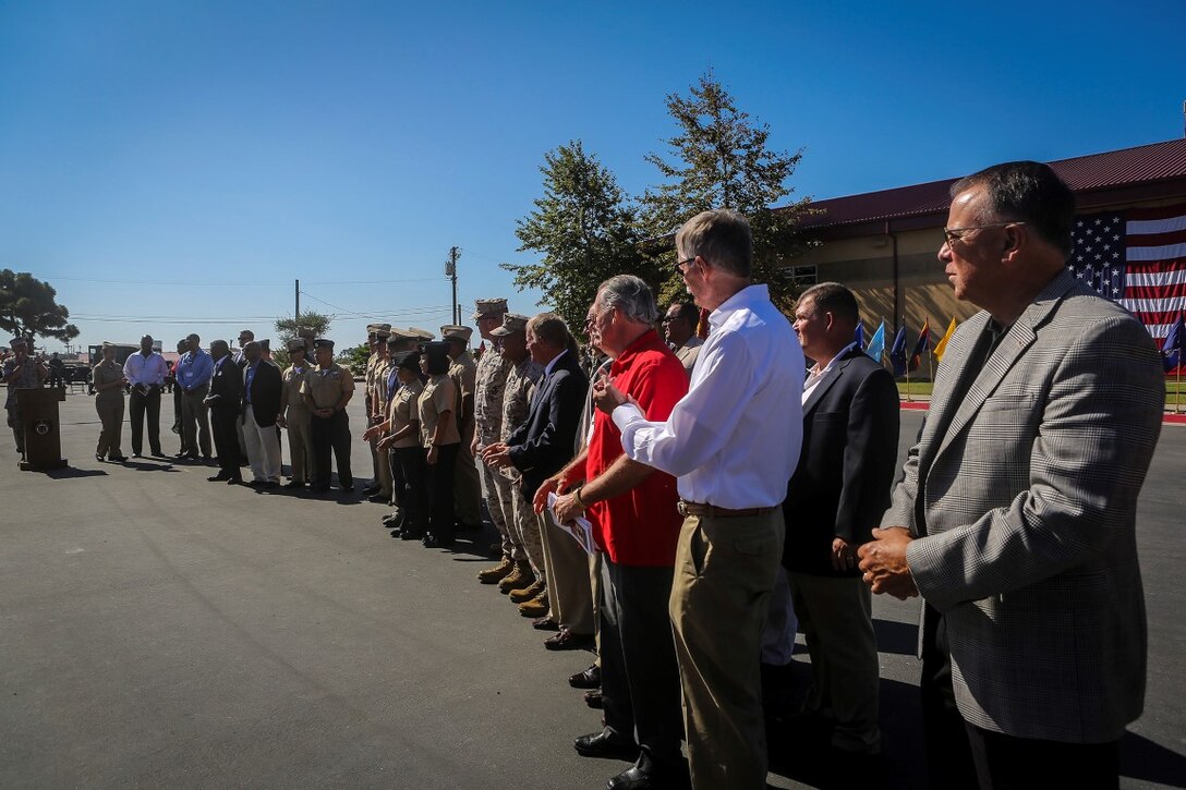Former Field Medical Training Battalion-West staff members were recognized during the 65th anniversary celebration of the training facility aboard Marine Corps Base Camp Pendleton, Calif., Sept. 18, 2015. The graduation ceremony was part of FMTB-West’s 65th anniversary celebration. The battalion opened its doors in the fall of 1950 and has trained young Sailors on life-saving techniques utilized on battlefields throughout history. The celebration was part of the graduation ceremony of Field Medical Service Technician Class 2015-040.  (U.S. Marine Corps Photo by Sgt. Rick Hurtado / Released).