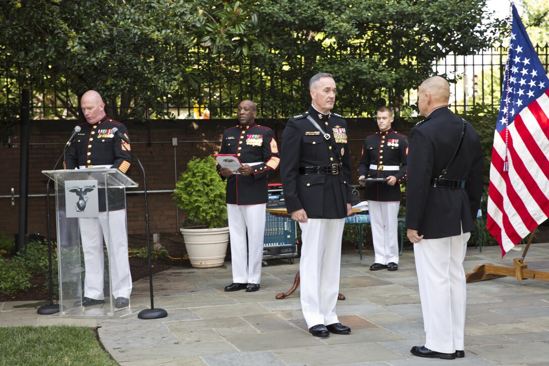 Commandant of the Marine Corps, Gen. Joseph F. Dunford, Jr., center right, officiates Gen. Robert B. Neller’s, right, promotion ceremony at Marine Barracks Washington, D.C., Sept. 24, 2015. Neller was promoted from the rank of lieutenant general to general in the Marine Corps. (U.S. Marine Corps photo by Sgt. Gabriela Garcia/Released)