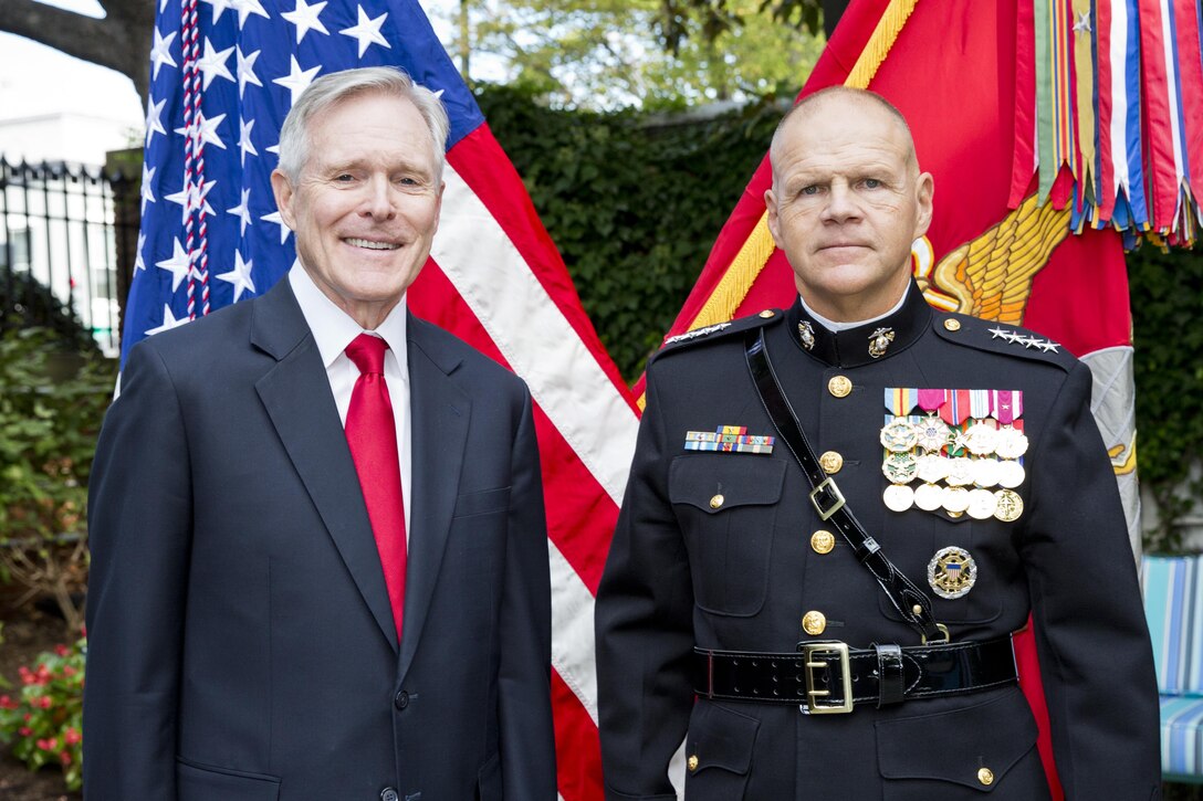 Secretary of the Navy, Raymond Edwin "Ray" Mabus, Jr., left, and Gen. Robert B. Neller, pose during Neller's promotion ceremony at Marine Barracks Washington, D.C., Sept. 24, 2015. Neller was promoted from the rank of lieutenant general to general in the Marine Corps. (U.S. Marine Corps photo by Sgt. Gabriela Garcia/Released)
