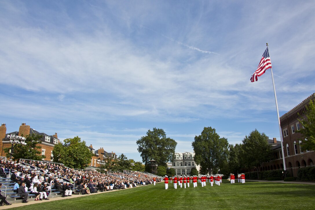 The United States Marine Drum & Bugle Corps perform during the Passage of Command at Marine Barracks Washington, D.C., Sept. 24, 2015. Gen. Robert B. Neller took command from Gen. Joseph F. Dunford, Jr. as the 37th Commandant of the Marine Corps. (U.S. Marine Corps photo by Sgt. Gabriela Garcia/Released)