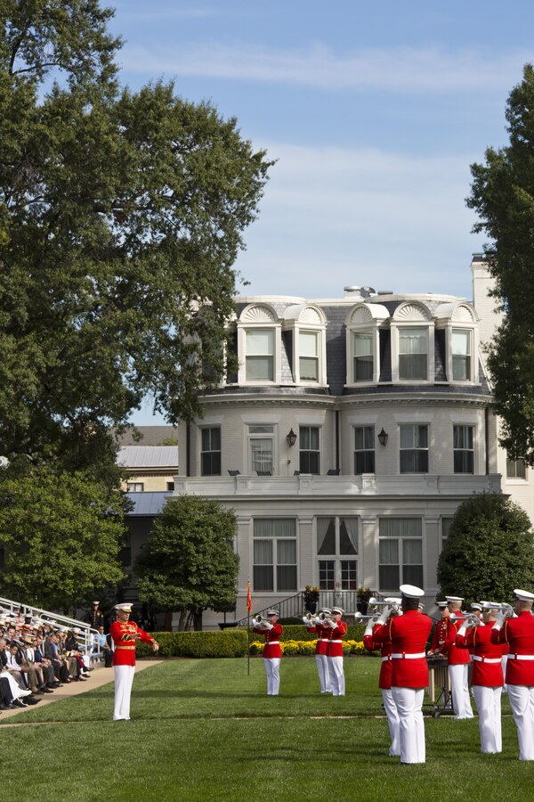 The United States Marine Drum & Bugle Corps perform during the Passage of Command at Marine Barracks Washington, D.C., Sept. 24, 2015. Gen. Robert B. Neller took command from Gen. Joseph F. Dunford, Jr. as the 37th Commandant of the Marine Corps. (U.S. Marine Corps photo by Sgt. Gabriela Garcia/Released)