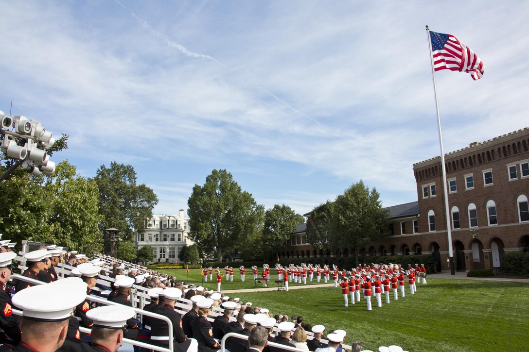 The United States Marine Drum & Bugle Corps perform during the Passage of Command at Marine Barracks Washington, D.C., Sept. 24, 2015. Gen. Robert B. Neller took command from Gen. Joseph F. Dunford, Jr. as the 37th Commandant of the Marine Corps. (U.S. Marine Corps photo by Sgt. Gabriela Garcia/Released)