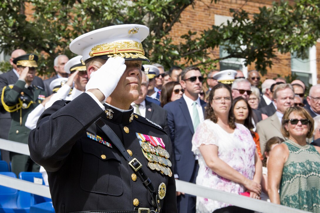 Commandant of the Marine Corps, Gen. Robert B. Neller, salutes during the Passage of Command at Marine Barracks Washington, D.C., Sept. 24, 2015. Neller took command from Gen. Joseph F. Dunford, Jr. as the 37th Commandant of the Marine Corps. (U.S. Marine Corps photo by Sgt. Gabriela Garcia/Released)