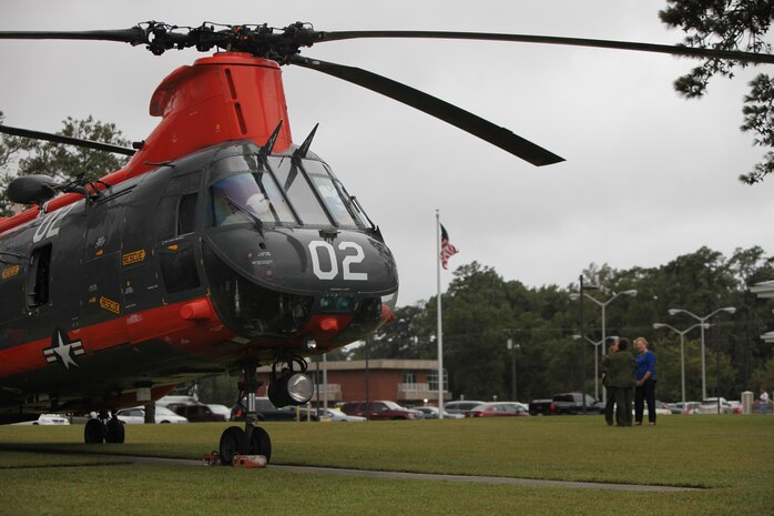 Pedro Helicopter “02” squats patiently at Miller’s Landing moments before its crew receives the order to launch on its final flight at Marine Corps Air Station Cherry Point, N.C., Sept. 25, 2015. This flight conducted with its two remaining fellow aircraft, will be the final “phrog” flight for the Department of Defense. Pedro’s distinctive orange and gray colors have been a familiar sight in eastern North Carolina, especially welcomed when the weathered has turned and someone is in distress at sea or the surrounding forests. (U.S. Marine Corps photo by Lance Cpl. Jason Jimenez/Released)