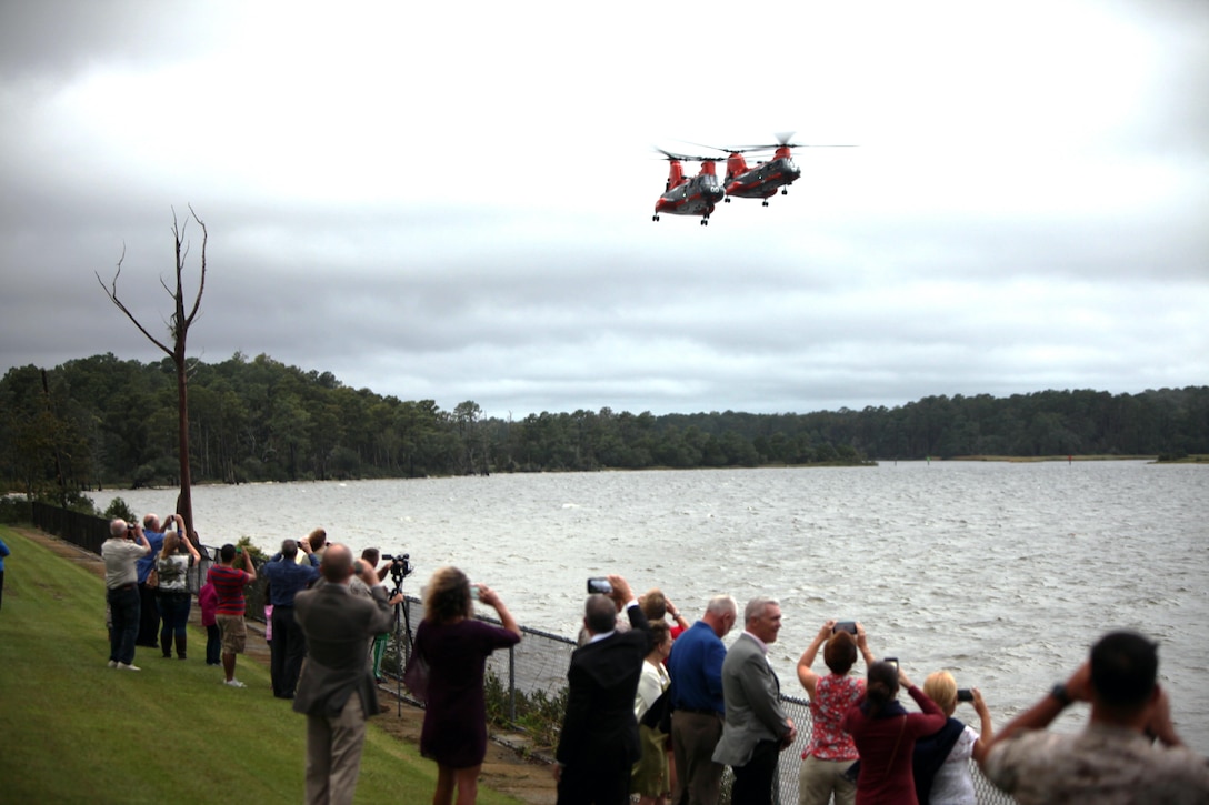 Pedro Helicopters “00” and “01” approach Miller’s Landing at Marine Corps Air Station Cherry Point, N.C., Sept. 25, 2015, where they will be joined by Pedro “02” for their final flight into Marine Corps history. These HH-46 search and rescue helicopters have been a visible symbol of the Marine Corps’ tight-knit relationship with the eastern North Carolina community for decades. Friends and family of the “phrog” community gathered at Cherry Point to say goodbye to this venerable flying machine. (U.S. Marine Corps photo by Lance Cpl. Jason Jimenez/Released)