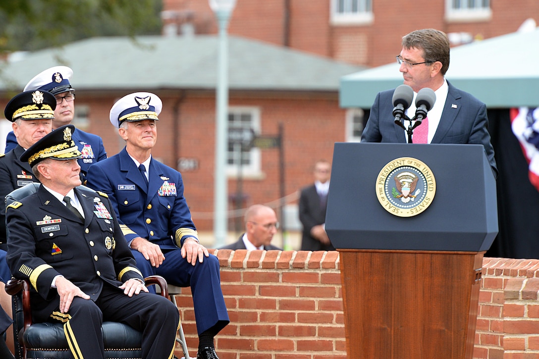 Defense Secretary Ash Carter delivers remarks during the change of responsibility ceremony between the outgoing Chairman of the Joint Chiefs of Staff Army Gen. Martin E. Dempsey and Marine Gen. Joseph F. Dunford Jr, the new chairman, on Summerall Field, Joint Base Myer-Henderson Hall, Arlington, Va., Sept. 25, 2015. DoD photo by U.S. Army Sgt. 1st Class Clydell Kinchen