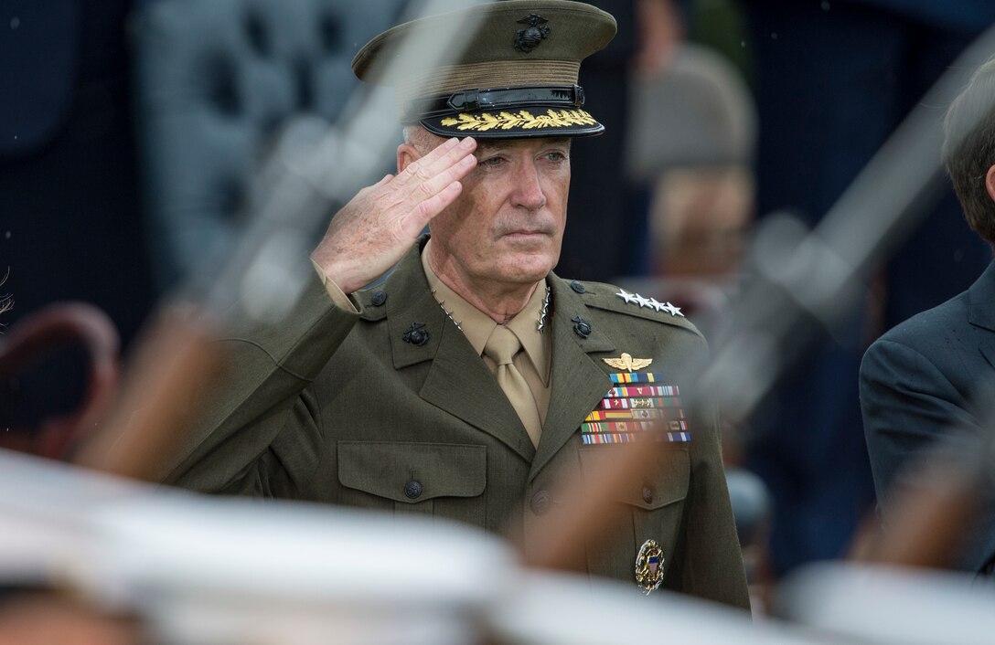 Marine Gen. Joseph Dunford, 19th chairman of the Joint Chiefs of Staff, salutes during a passing review during Army Gen. Martin E. Dempsey, 18th chairman of the Joint Chiefs of Staff's retirement and change of responsibility ceremony, on Summerall Field, Joint Base Myer-Henderson Hall, Arlington, Va., Sept. 25, 2015. DoD photo by Navy Petty Officer 2nd Class Dominique A. Pineiro