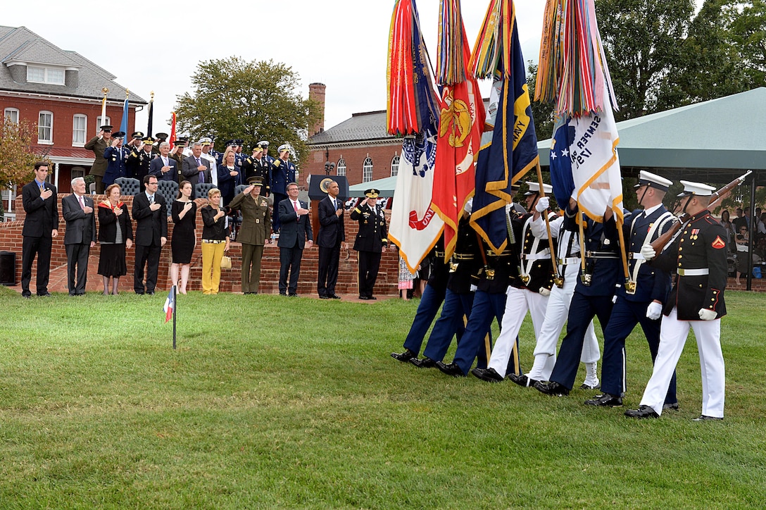 Service members perform a pass and review at the change of responsibility ceremony between Army General Martin E. Dempsey, outgoing chairman of the Joint Chiefs of Staff, and Jospeph Dunford, the incoming chair, on Joint Base Myer-Henderson Hall, Arlington, Va., Sept. 25, 2015. DoD photo by U.S. Army Sgt. 1st Class Clydell Kinchen