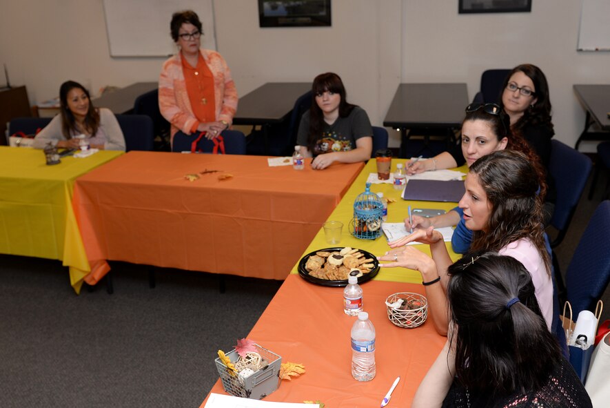 Military Spouses participate in a discussion during the Heartlink spouse orientation at Sheppard Air Force Base, Texas, Sept. 24, 2015. Heartlink aims to help inform and adjust spouses to the military ways of life while having fun and making friends. (U.S. Air Force photo/Senior Airman Kyle Gese)