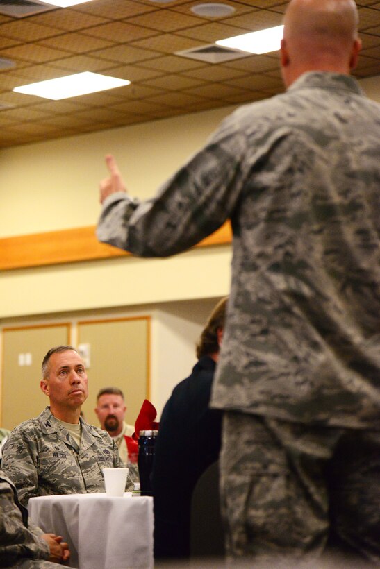 Chaplain (Maj.) Jason Botts, 341st Missile Wing chaplain, gives the opening story for a Storytellers event Sept. 23, 2015, at the Grizzly Bend, Malmstrom Air Force Base, Mont. Base personnel listen to fellow Airmen talk about challenges they have faced and how they showed resiliency to overcome them. (U.S. Air Force photo/Airman 1st Class Magen M. Reeves)