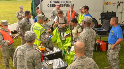 Members of the 628th Medical Group and the 628th Civil Engineering Squadron participate in a hazardous material exercise on Joint Base Charleston – Air Base, S.C., Sept. 25, 2015. The two units from the 628th CES were the emergency management group and fire department. (U.S. Air Force photo/Airman 1st Class Thomas T. Charlton)