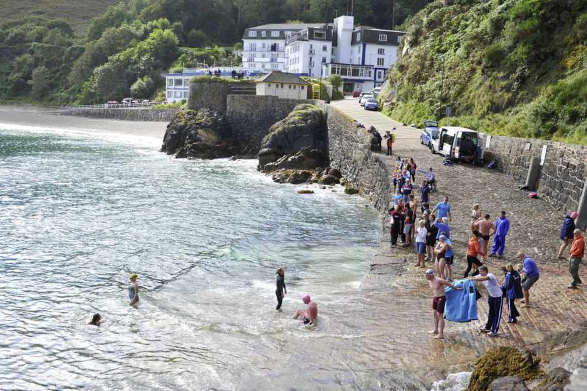 The round island swim was moved to the sheltered waters of Bouley Bay due to high winds and unfavorable swimming conditions.  USAF photo by Tony Pike 
