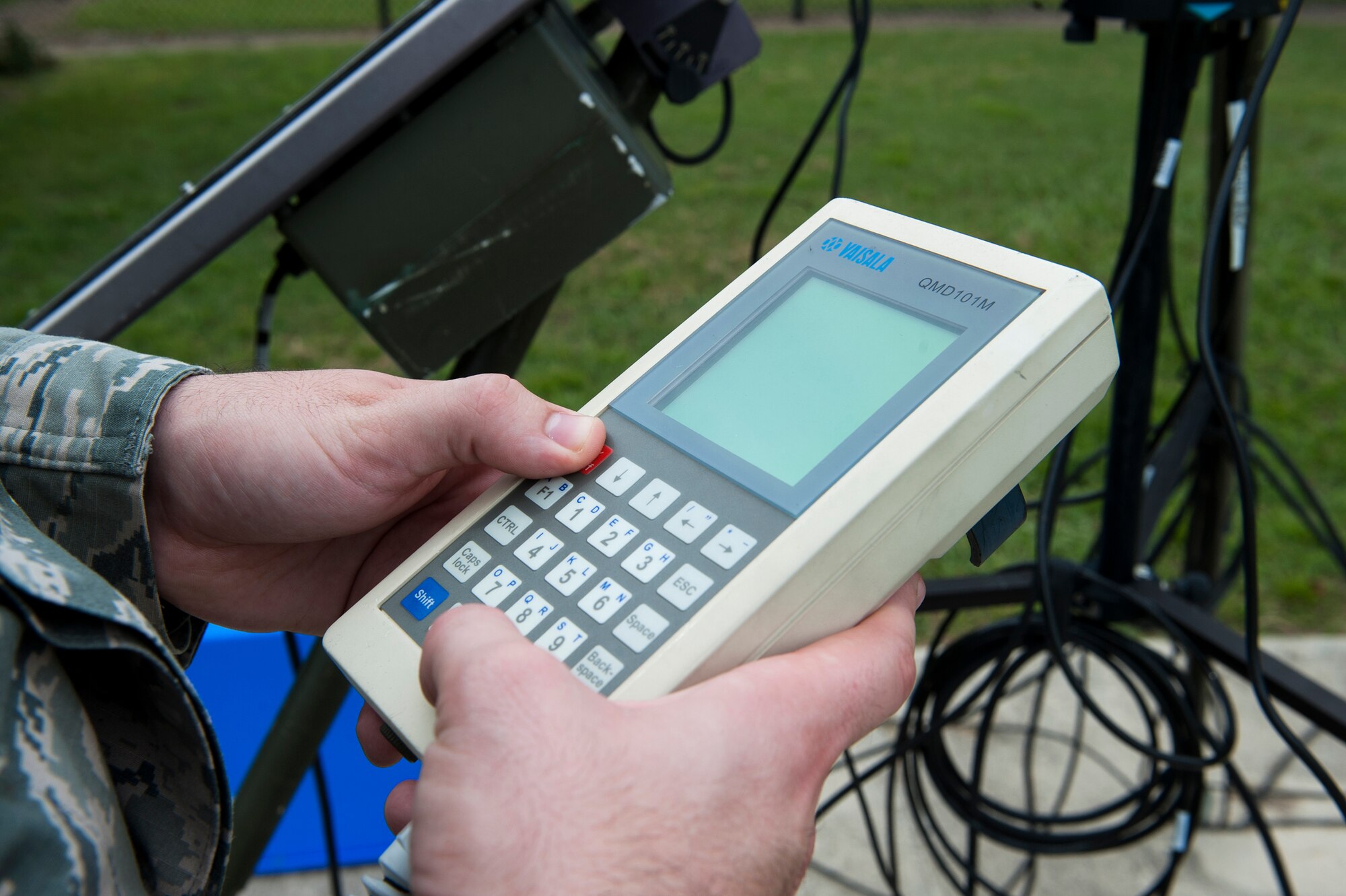 U.S. Air Force Airman 1st Class Lucas Payne, 23d Operations Support Squadron weather technician, uses a handheld display for observing weather Sept. 21, 2015, at Moody Air Force Base, Ga. The handheld display connects to a meteorological observing system that provides the weather forecast. (U.S. Air Force photo by Airman 1st Class Kathleen D. Bryant/Released)
