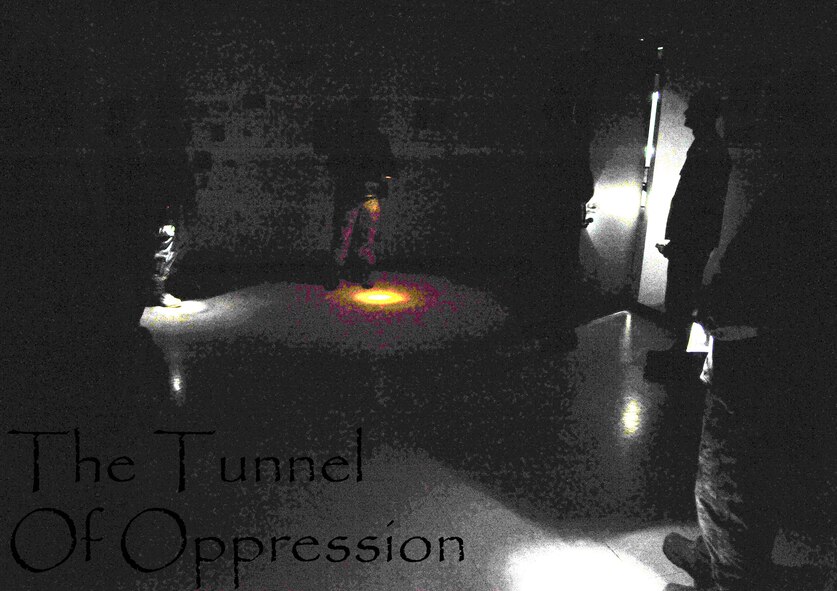 The Tunnel of Oppression is a resource provided to Grand Forks Air Force Base Airmen to help them realize that they are not alone. It provides a safe and anonymous environment to talk about serious issues such as, bullying, sexual assault, drug abuse and many others. The participants are in civilian clothes and use flashlights to navigate the Tunnel to allow them to feel comfortable enough to speak openly. (U.S. Air Force photo illustration by Airman 1st Class Ryan Sparks/Released)