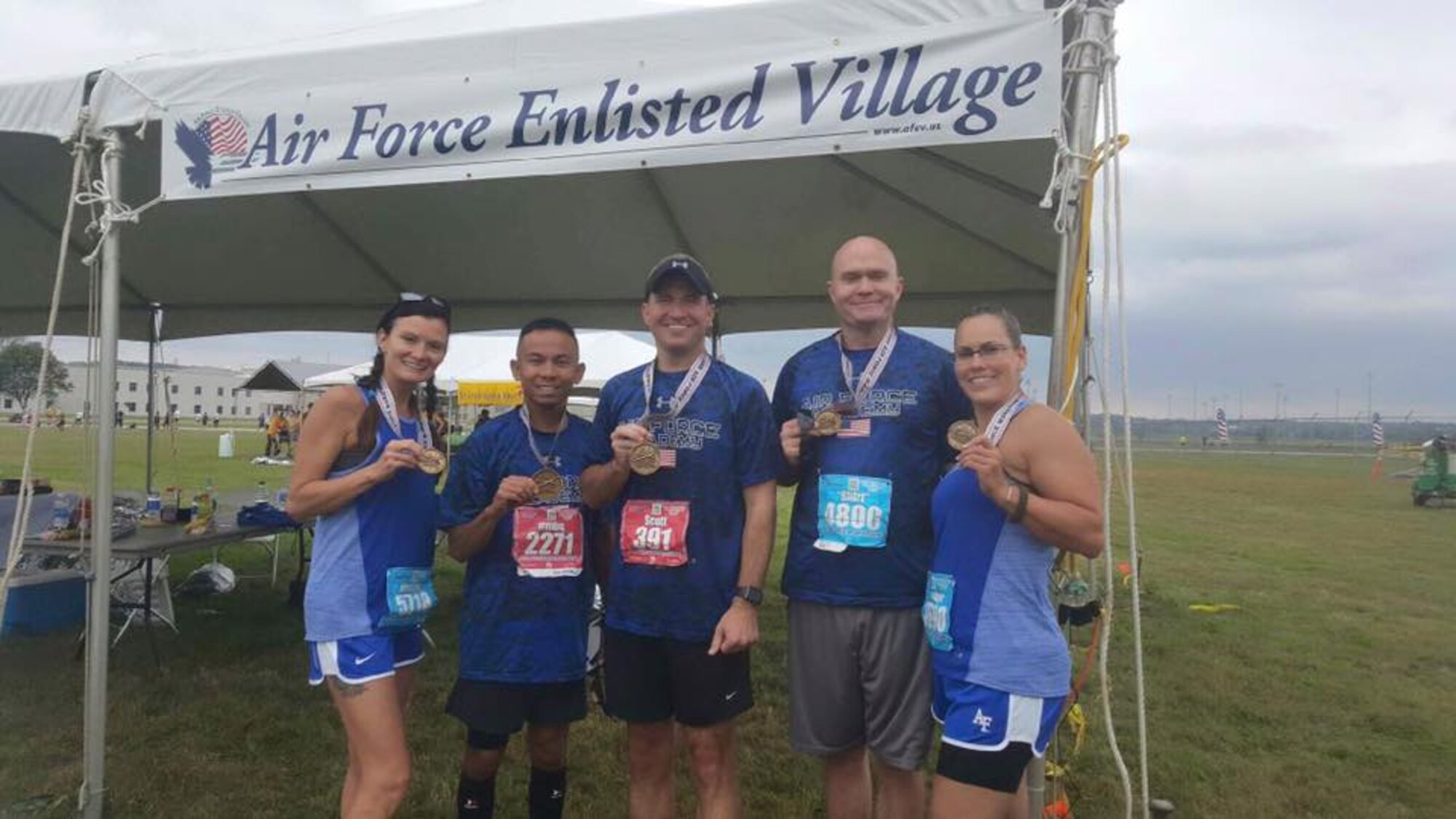 Five NCOs at the Air Force Academy competed in the 19th annual Air Force Marathon in Ohio, Sept. 19, 2015. The Academy runners were (left to right) Heather Henry, Marlon Quitos, Scott Borlinghaus,  Keith Eberhardt and Heather Blanchard. (U.S. Air Force photo/Jena Sweeney)
