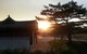 The sun sets on Gyeongbokgung Palace in Seoul, South Korea Aug. 28, 2015 during the closeout of the multi-national exercise, Ulchi Freedom Guardian 2015, Osan Air Base, Korea. During the exercise, real world tensions evolved between North and South Korea, however the exercise pushed on to a successful completion. (U.S. Air National Guard photo submitted by Col. Thomas James/Released)