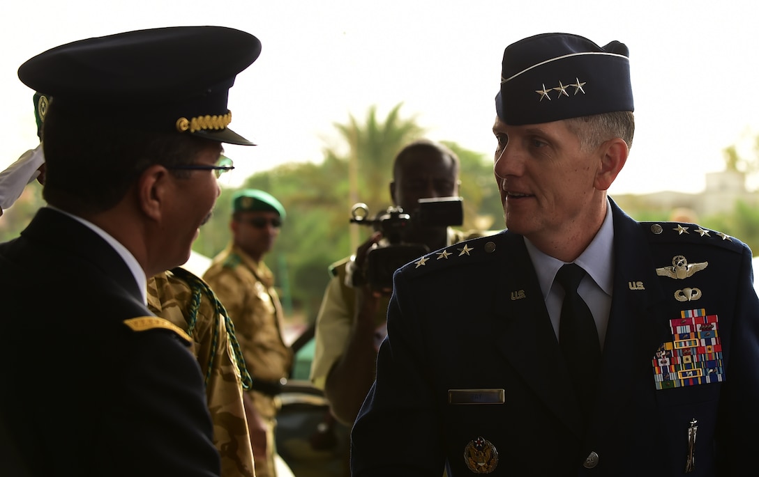 Mauritanian Air Force Chief of Staff Col. Mohamed Lehreitani greets U.S. 17th Expeditionary Air Force Commander Lt. Gen. Timothy Ray as he arrives at the Palais des Congres for the opening ceremony of the 5th Annual African Air Chiefs Symposium in Nouakchott, Mauritania, Sept. 15, 2015. The Mauritanian Air Force is co-hosting this year’s African Air Chiefs Symposium along-side U.S. Air Forces Africa Sept. 14-17.  The event gives Air Chiefs from the U.S. and 18 African countries the chance to discuss the role of Air Power in addressing African challenges. (U.S. Air Force photo by Master Sgt. Chrissy Best/Released)