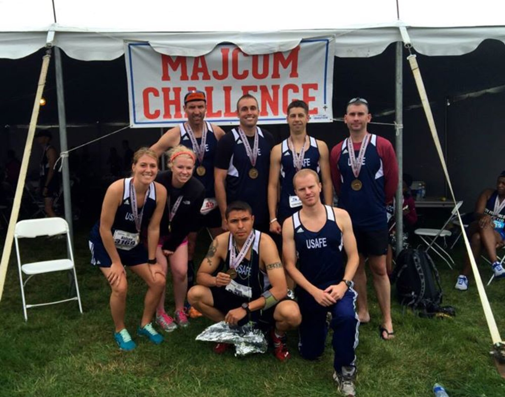 Members of the United States Air Forces in Europe Major Command Challenge team display their half- and full-marathon finishers’ medals on Sept. 19, 2015, at Wright-Patterson Air Force Base, Ohio. The team competed against other Air Force MAJCOM teams for the Challenge trophy, which will be awarded to the winning MAJCOM commander at Corona Top summit in the fall. (U.S. Air Force photo by Staff Sgt. Joshua Johnson/Released)