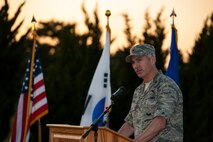 Col. Jeremy Sloane, 8th Fighter Wing commander, gives the closing remarks during a Prisoner of War/Missing in Action ceremony at Kunsan Air Base, Republic of Korea, Sept. 17, 2015. The ceremony honored more than 80,000 Service members who are prisoners of war or missing in action. (U.S. Air Force photo by Staff Sgt. Nick Wilson/Released)