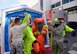 Airmen assigned to the 51st Civil Engineer Squadron's emergency management office assist firefighters with removing their hazardous material suits Sept. 24, 2015, near the city of Songtan, Republic of Korea. More than 25 members from Osan Air Base participated in the training exercise which took place near a local factory. (U.S. Air Force photo by Staff Sgt. Benjamin Sutton) 