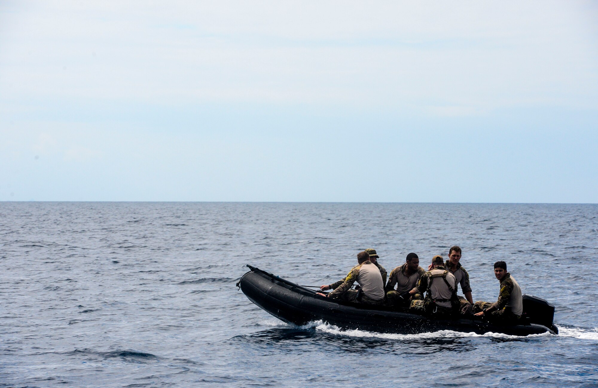 A U.S. Air Force special tactics team from the 320th Special Tactics Squadron, Kadena Air Base, conducts a boat navigation exercise Sept. 22, 2015, off the west coast of Okinawa, Japan. Special tactics teams are fast-reaction, rapidly deployable Air Force units comprised of combat control team, pararescue, and special operations weather team Airmen. (U.S. Air Force photo by Senior Airman John Linzmeier)