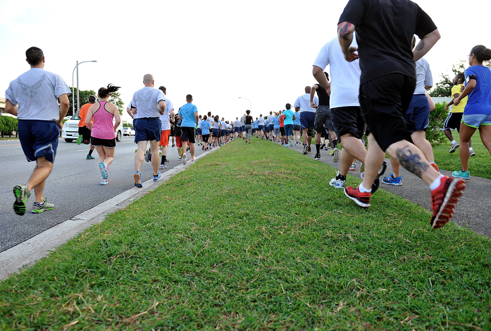 Service members, family members and civilians participate in a 2.2 mile run for Suicide Prevention Awareness Month Sept. 25, 2015, on Kadena Air Base, Japan. Approximately 600 runners participated in a 2.2 mile run for suicide prevention awareness month to intended to increase awareness and prevention efforts. (U.S. Air Force photo by Naoto Anazawa)