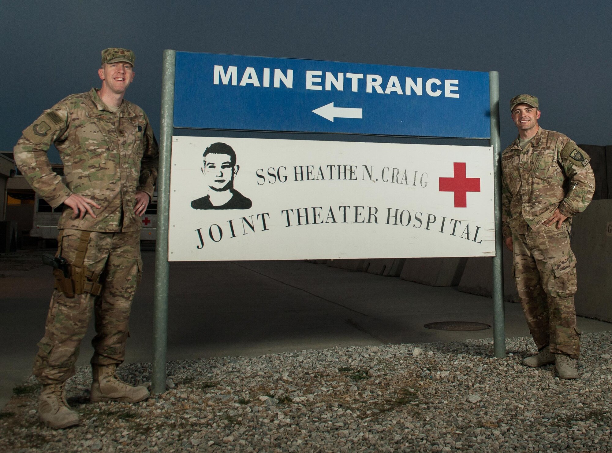 U.S. Air Force Tech. Sgt. Scott Hatch, right, and Maj. Thomas Naughton, both assigned to the 455th Expeditionary Medical Group, pose for a photo near the Craig Joint Theater Hospital at Bagram Airfield, Afghanistan, Sept. 24, 2015. (U.S. Air Force photo by Tech. Sgt. Joseph Swafford/Released)