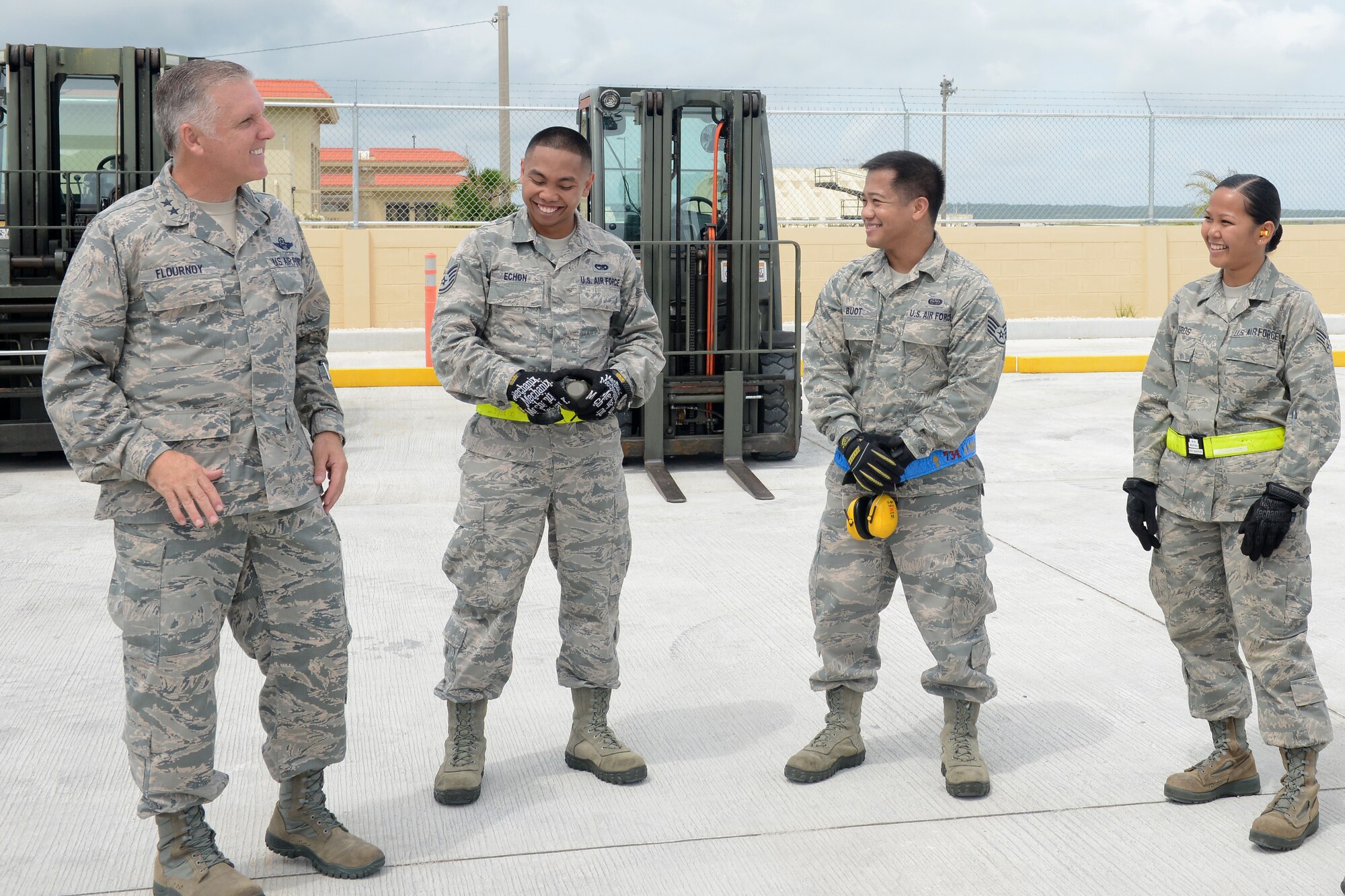 Maj. Gen. John C. Flournoy Jr., 4th Air Force commander, speaks with Airmen from the 44th Aerial Port Squadron Sept. 19, 2015, at Andersen Air Force Base, Guam. Flournoy’s visit to Guam was to meet with Airmen from the 624th Aerospace Medicine Flight and the 44th Aerial Port Squadron, geographically separated units of the 624th Regional Support Group from Joint Base Pearl Harbor-Hickam, which is part of the Air Force Reserve Command.  (U.S. Air Force photo by Airman 1st Class Arielle Vasquez/Released)