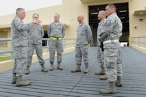 Maj. Gen. John C. Flournoy Jr., 4th Air Force commander, speaks with Airmen from the 44th Aerial Port Squadron Sept. 19, 2015, at Andersen Air Force Base, Guam. Flournoy’s visit to Guam was to meet with Airmen from the 624th Aerospace Medicine Flight and the 44th Aerial Port Squadron, geographically separated units of the 624th Regional Support Group from Joint Base Pearl Harbor-Hickam, which is part of the Air Force Reserve Command. (U.S. Air Force photo by Airman 1st Class Arielle Vasquez/Released)