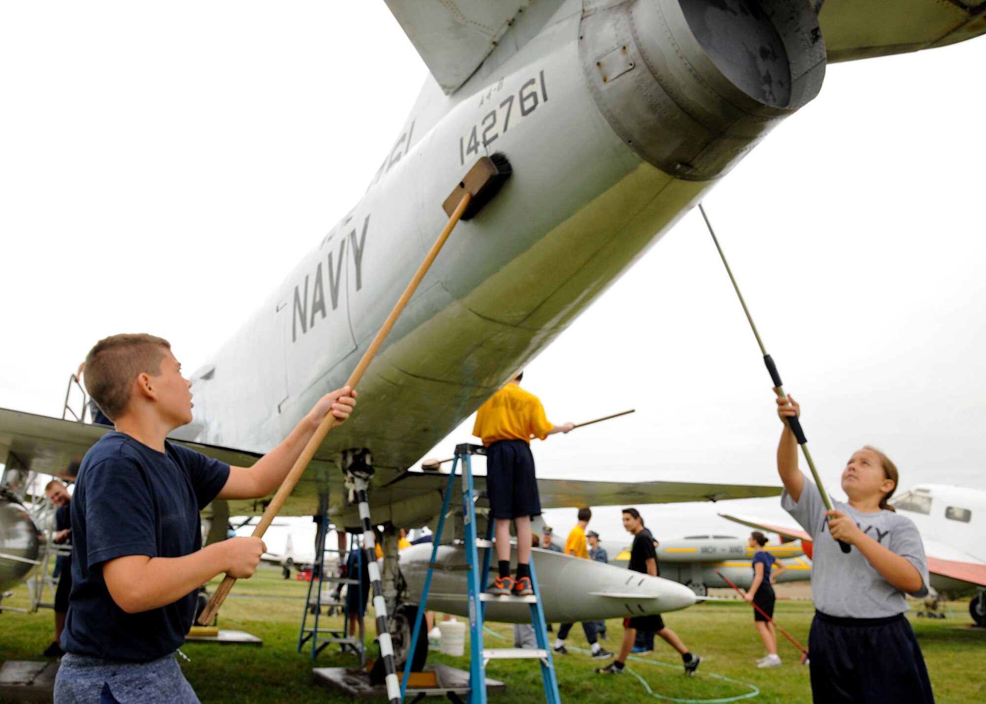 Sea Cadets from the Tomcat squadron, wash an A-4B Skyhawk at the Selfridge
Military Air Museum on Selfridge Air National Guard Base, Michigan, Sept.
27, 2015. The Tomcat squadron recently adopted the A-4B Skyhawk and helps
keep the aircraft in top shape. The Skyhawk is a single seat carrier-capable
attack aircraft developed for the United States Navy. The Skyhawk was
operated at Selfridge ANGB from 1969 to 1973. (U.S. Air National Guard photo
by Senior Airman Ryan Zeski/Released)
