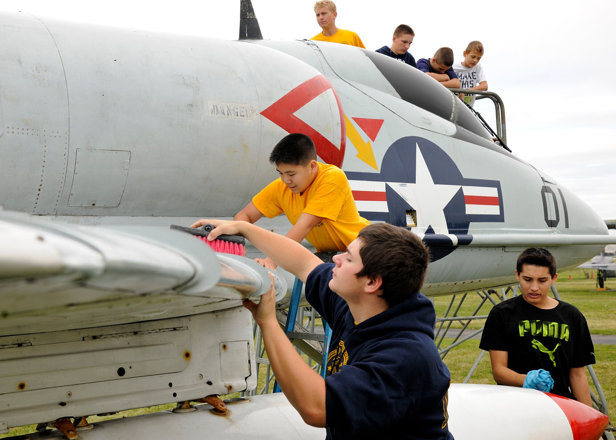 Sea Cadets from the Tomcat squadron, wash an A-4B Skyhawk at the Selfridge
Military Air Museum on Selfridge Air National Guard Base, Michigan, Sept.
27, 2015. The Tomcat squadron recently adopted the A-4B Skyhawk and helps
keep the aircraft in top shape. The Skyhawk is a single seat carrier-capable
attack aircraft developed for the United States Navy. The Skyhawk was
operated at Selfridge ANGB from 1969 to 1973. (U.S. Air National Guard photo
by Senior Airman Ryan Zeski/Released)
