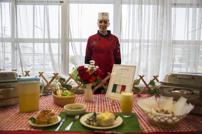 Cpl. Veronica Shoemake, a food service specialist with Headquarters and Headquarters Squadron, poses for a picture after winning the Chef of the Quarter competition at the R.G. Robinson Mess Hall on Marine Corps Air Station Iwakuni, Japan, Sept. 24, 2015. This is Shoemake’s second time winning this competition. A package, including everything Shoemake has done during the third quarter, will be submitted to Marine Corps Installations Pacific allowing her to compete against other regional winners of the Chef of the Quarter competition.