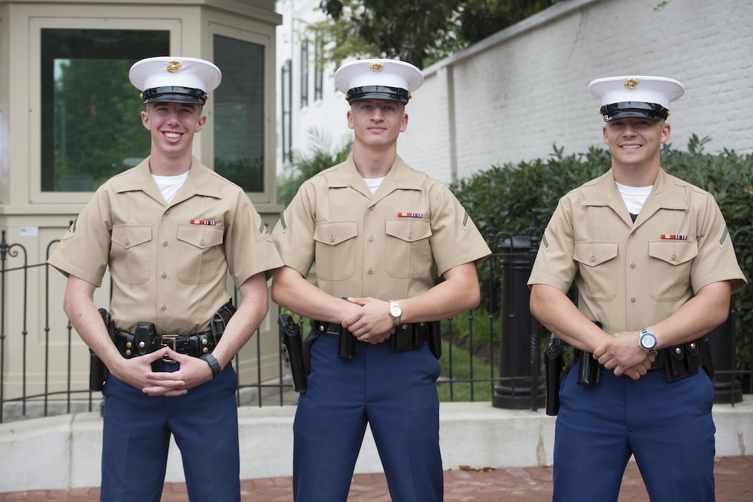 Marines from Guard Company stand post on the corner of 8th and G Streets, Southeast D.C., during the annual Barracks Row Association, Fall Festival, Sept. 26, 2015. Marines from Marine Barracks Washington, D.C. volunteer to set-up and tear-down the festival. Additionally, Marines from the United States Marine Band, the Marine Corps Color Guard, the Silent Drill Platoon and Chesty XIV provide support and entertainment throughout the event.(U.S. Marine Corps photo by Cpl. Skye Davis/Released)
