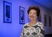 Maria Bandouveres, the executive assistant to the C3I and Networks program executive officer, stands alongside the portraits of all 19 Electronic Systems Division and Electronic Systems Center commanders at Hanscom Air Force Base, Mass., Sept. 15, 2015. Bandouveres, who has been a civil service employee since June 1944, has worked on the command staff for 17 of thoe 19 commanders. (U.S. Air Force photo/Mark Herlihy)