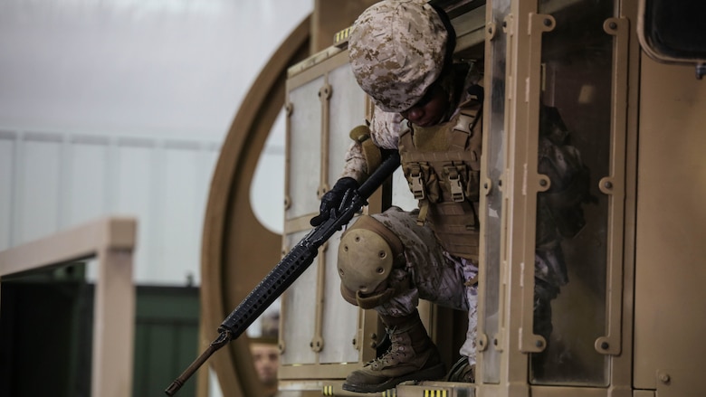 A Marine with 2nd Supply Battalion, Combat Logistics Regiment 25, exits a simulator at Marine Corps Base Camp Lejeune, North Carolina, Sept. 23, 2015. The battalion conducted the training to remain proficient in potentially life-saving skills as they prepare to deploy around the globe. 