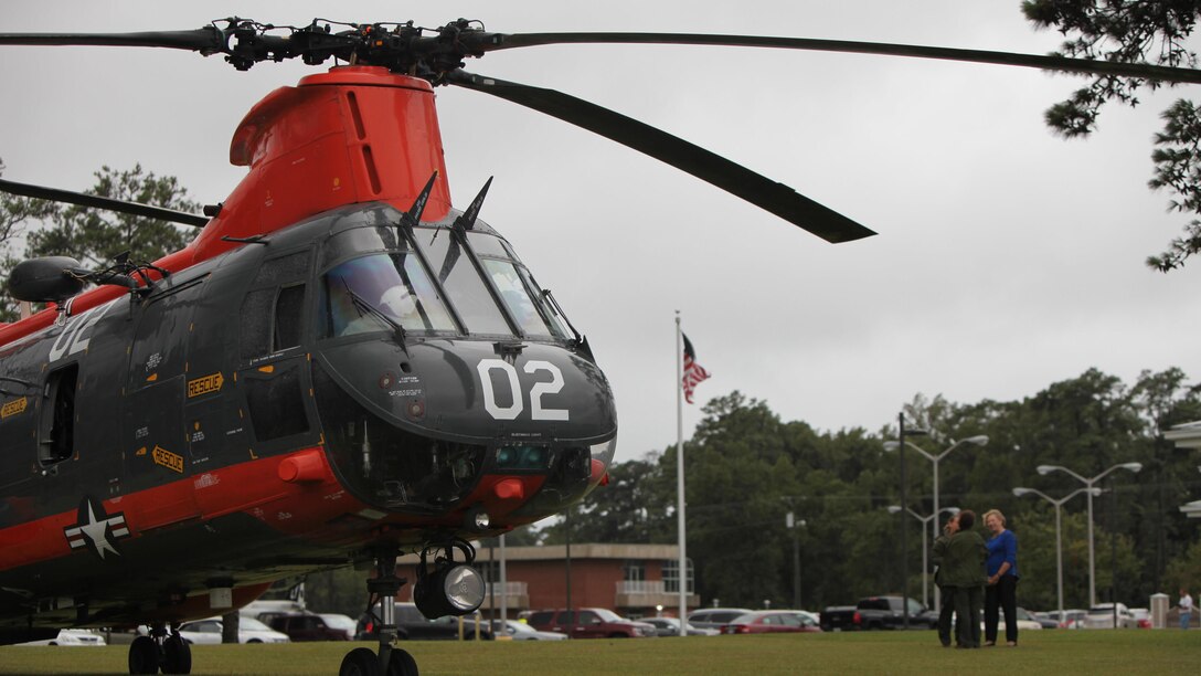 Pedro Helicopter “02” squats patiently at Miller’s Landing moments before its crew receives the order to launch on its final flight at Marine Corps Air Station Cherry Point, N.C., Sept. 25, 2015. This flight conducted with its two remaining fellow aircraft, will be the final “phrog” flight for the Department of Defense. Pedro’s distinctive orange and gray colors have been a familiar sight in eastern North Carolina, especially welcomed when the weathered has turned and someone is in distress at sea or the surrounding forests.