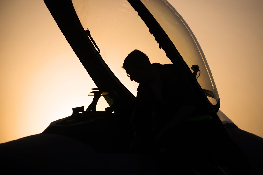 U.S. Air Force Airman 1st Class Dexter Fitzpatrick performs a preflight inspection on an F-16 Fighting Falcon on Bagram Airfield, Afghanistan, Sept. 15, 2015. Fitzpatrick is assigned to the 455th Expeditionary Aircraft Maintenance Squadron. U.S. Air Force photo by Tech. Sgt. Joseph Swafford
