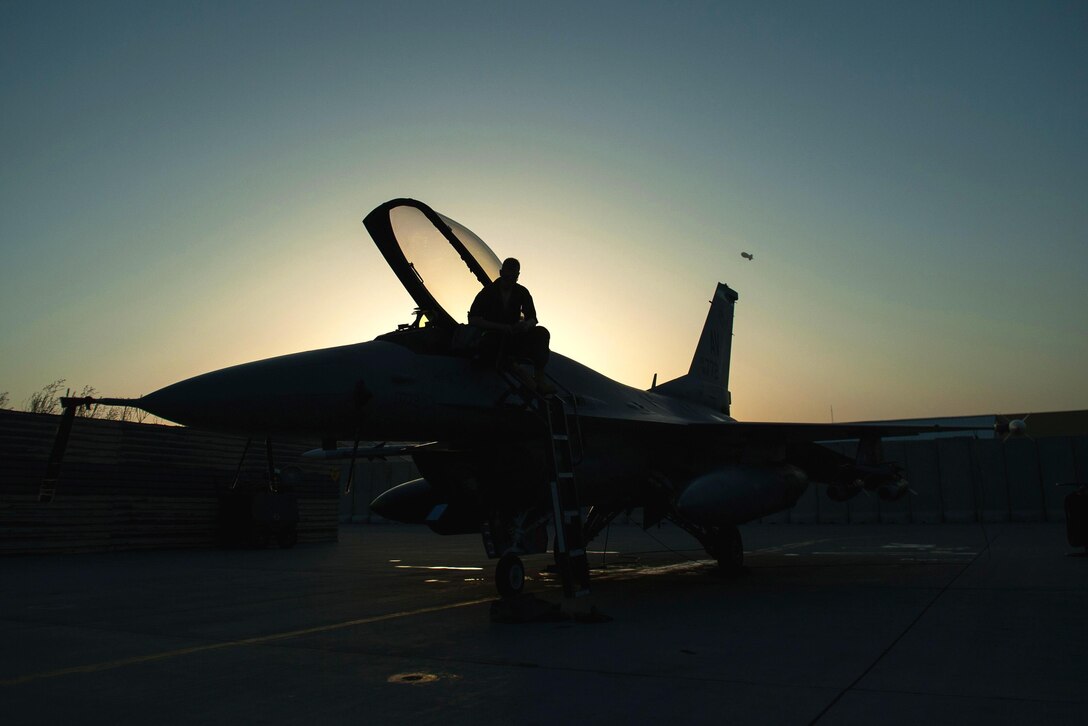 U.S. Air Force Airman 1st Class Dexter Fitzpatrick performs a preflight inspection on an F-16 Fighting Falcon aircraft on Bagram Airfield, Afghanistan, Sept. 15, 2015. Fitzpatrick is assigned to the 455th Expeditionary Aircraft Maintenance Squadron. U.S. Air Force photo by Tech. Sgt. Joseph Swafford