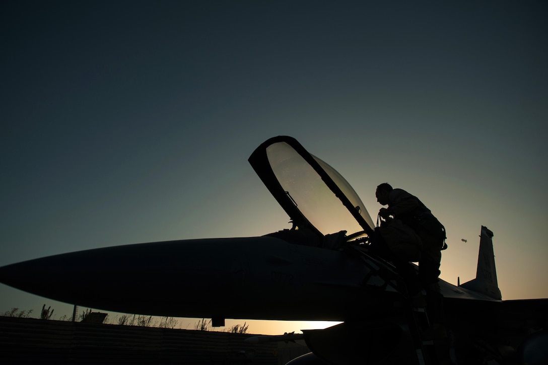 A U.S. Air Force F-16 Fighting Falcon pilot prepares for a combat sortie on Bagram Airfield, Afghanistan, Sept. 15, 2015. U.S. Air Force photo by Tech. Sgt. Joseph Swafford