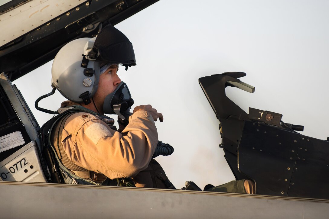 A U.S. Air Force F-16 Fighting Falcon pilot prepares for a combat sortie on Bagram Airfield, Afghanistan, Sept. 15, 2015. U.S. Air Force photo by Tech. Sgt. Joseph Swafford
