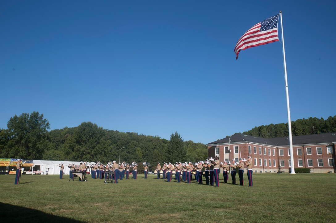The Battle Color Detachment, consisting of the Marine Corps Color Guard, the Silent Drill Platoon and the United States Marine Drum and Bugle Corps perform during the Modern Day Marine Expo on Marine Corps Base Quantico, Va., Sept. 23, 2015. (U.S. Marine Corps photo by Cpl. Christian Varney/Released)