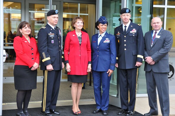 Maj. Gen. Stayce Harris, 22nd Air Force commander (fourth 
from left), has her photo taken after being welcomed to the University of North Georgia by Dr. Bonita Jacobs, UNG President, as part of the Honor2Lead leadership symposium in Dahlonega, Ga., Sept. 25, 2015. Also in attendance were Dr. Donna Mayo, Dean - Mike Contrell College of Business, Lt. Gen. James Terry, Commander of Combined Joint Task Force--Operation Inherent Resolve, Jacobs, Brig. Gen. Joseph Jarrard, adjutant general, Georgia Department of Defense, and Mr. Billy Wells, UNG Vice President of Executive Affairs. (U.S. Air Force photo/Lt. Col. James R. Wilson)

