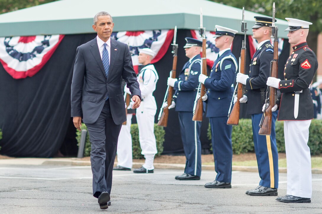 President Barack Obama attends the chairman change of responsibility ceremony on Joint Base Myer-Henderson Hall in Arlington, Va., Sept. 25, 2015. During the ceremony, Army Gen. Martin E. Dempsey, outgoing chairman of the Joint Chiefs of Staff, retired from the military after 41 years of service and was succeeded as chairman by Marine Corps Gen. Joseph F. Dunford Jr. DoD photo by D. Myles Cullen