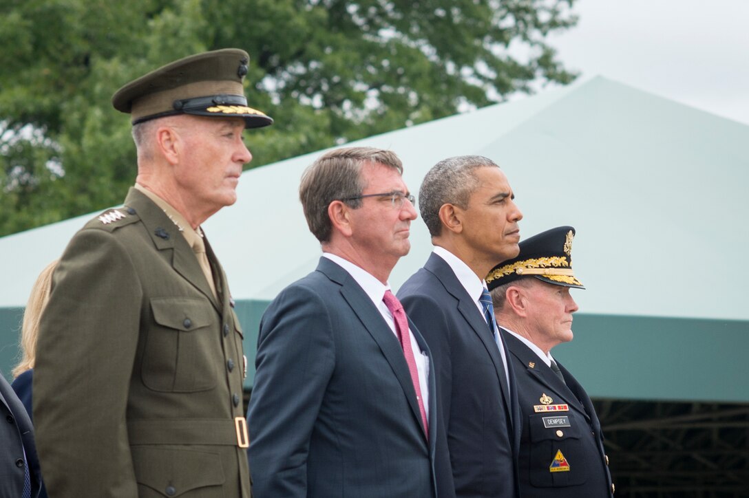 From left, Marine Corps Gen. Joseph F. Dunford Jr., chairman of the Joint Chiefs of Staff; Defense Secretary Ash Carter; President Barack Obama; and Army Gen. Martin E. Dempsey, the outgoing chairman, attend a ceremony for Dempsey’s retirement and the chairman change of responsibility on Joint Base Myer-Henderson Hall in Arlington, Va., Sept. 25, 2015. DoD photo by D. Myles Cullen