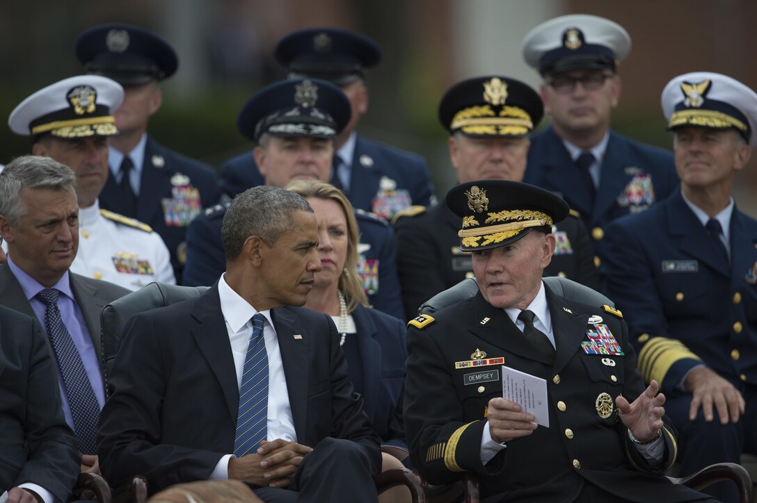 President Barack Obama talks with Army Gen. Martin E. Dempsey, outgoing chairman of the Joint Chiefs of Staff, during a ceremony for Dempsey's retirement and the chairman of the Joint Chiefs of Staff change of responsibility ceremony on Joint Base Myer-Henderson Hall in Arlington, Va., Sept. 25, 2015. DoD photo by Petty Officer 2nd Class Dominique A. Pineiro